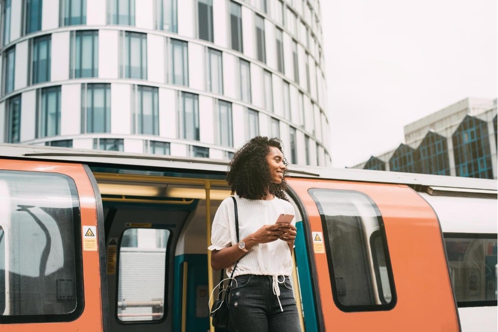 girl coming out from a tram