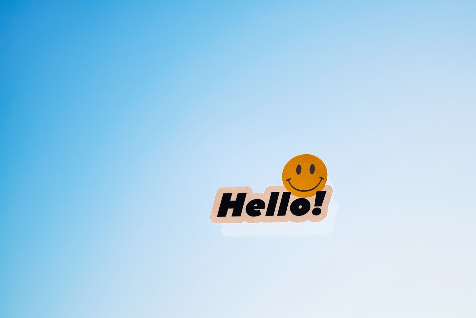A smiley face with the word hello!